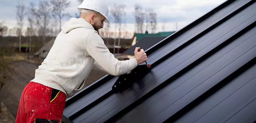Tin Roof Ridge Cap Installation in Maywood